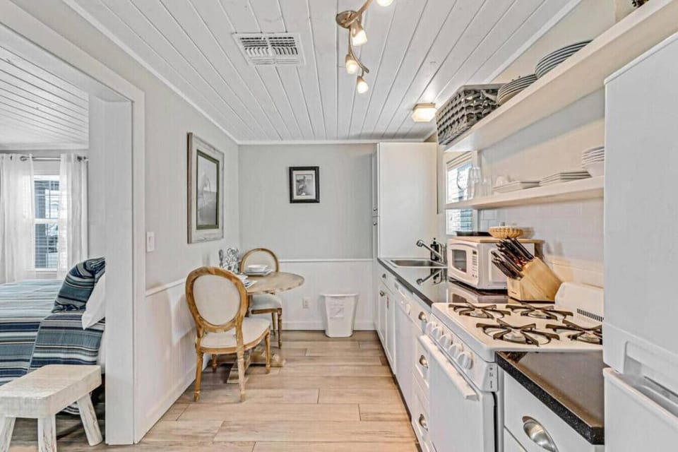 Dining area with seating for meals or game night.