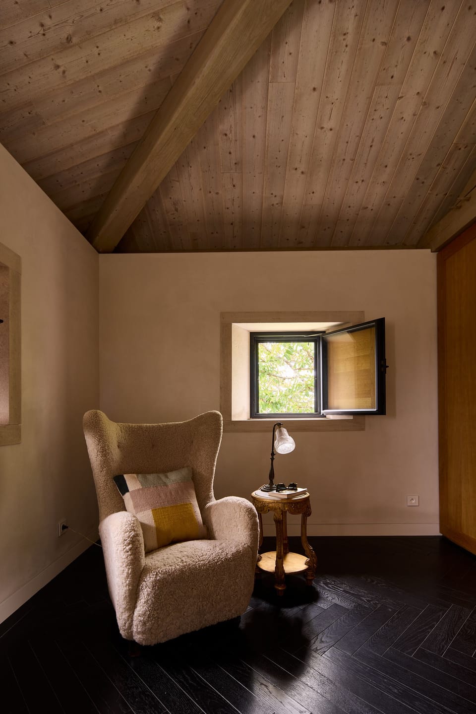La Maison south bedroom with reading chair