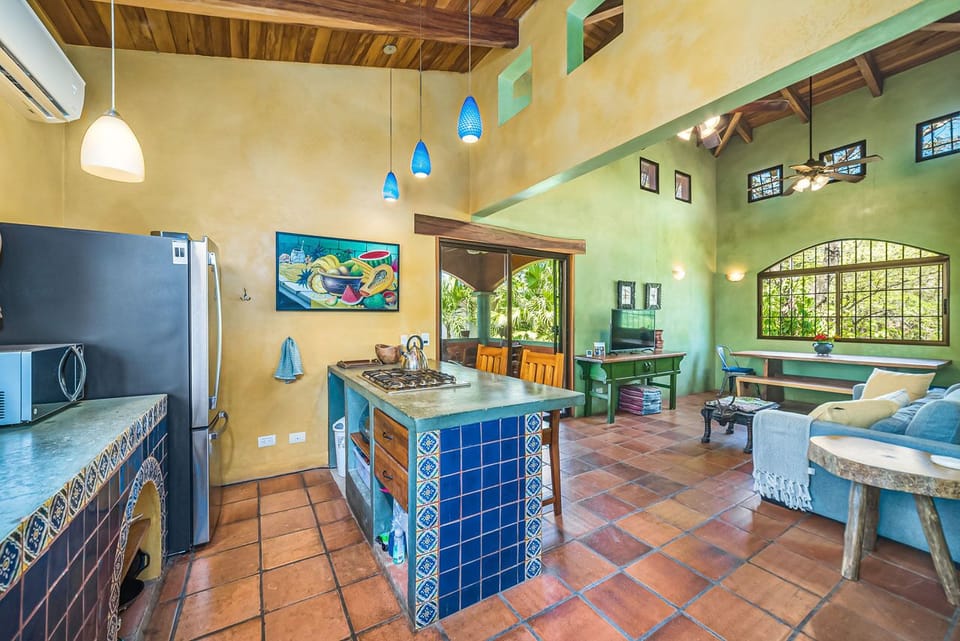 Access to the outdoor terrace through kitchen, living and dining area