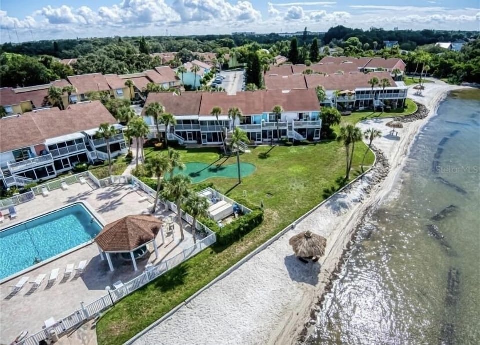 Private beach with beachfront pool & clubhouse