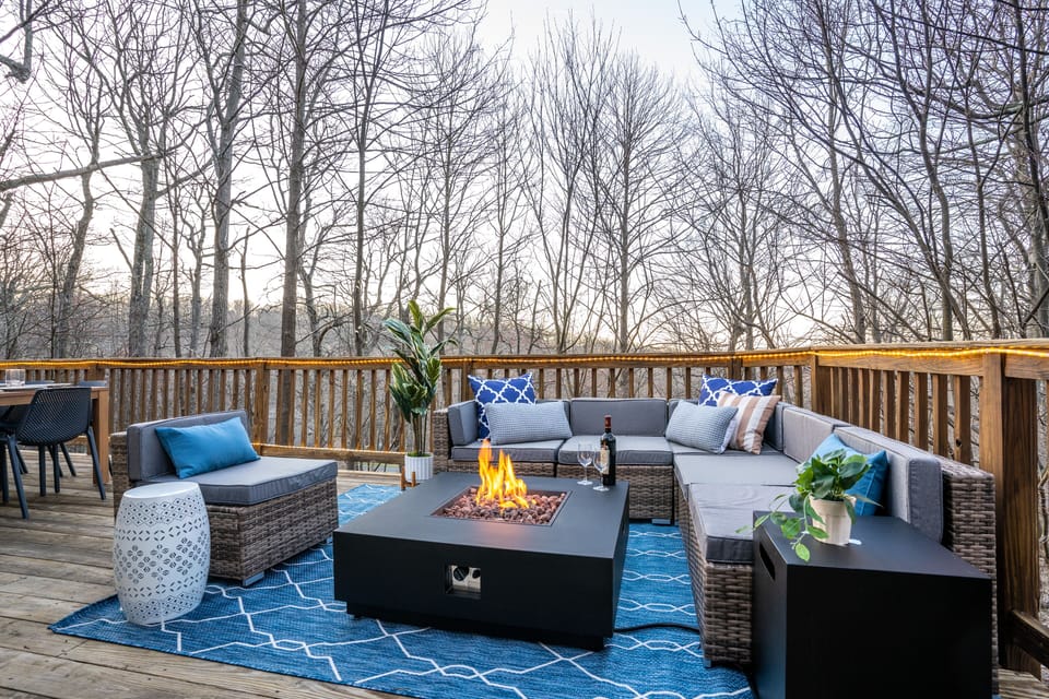New patio furniture and propane fire table on the upper deck.