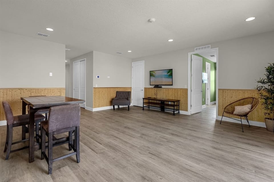 Another view of the spacious second living room with access to the other bedrooms.
