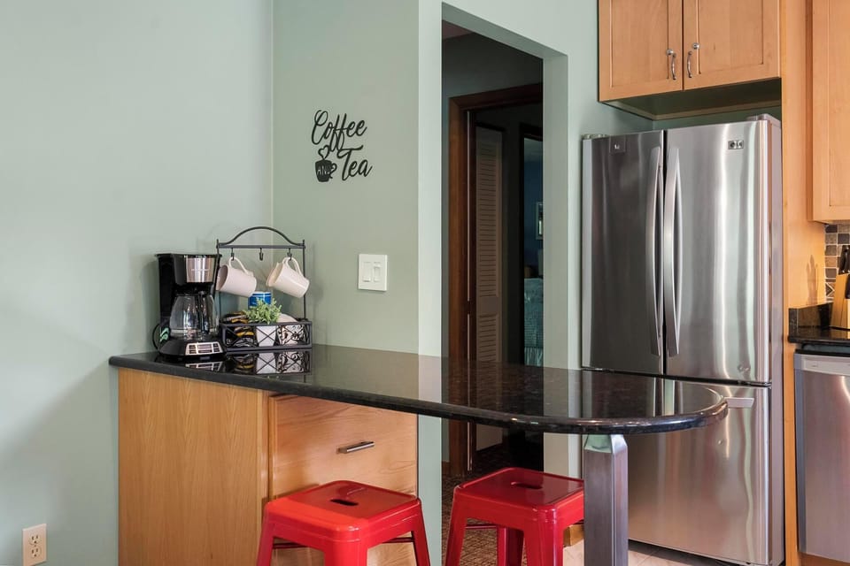 Coffee bar - Enjoy your morning coffee, tea or hot chocolate!  Additional storage in drawers under the bar.