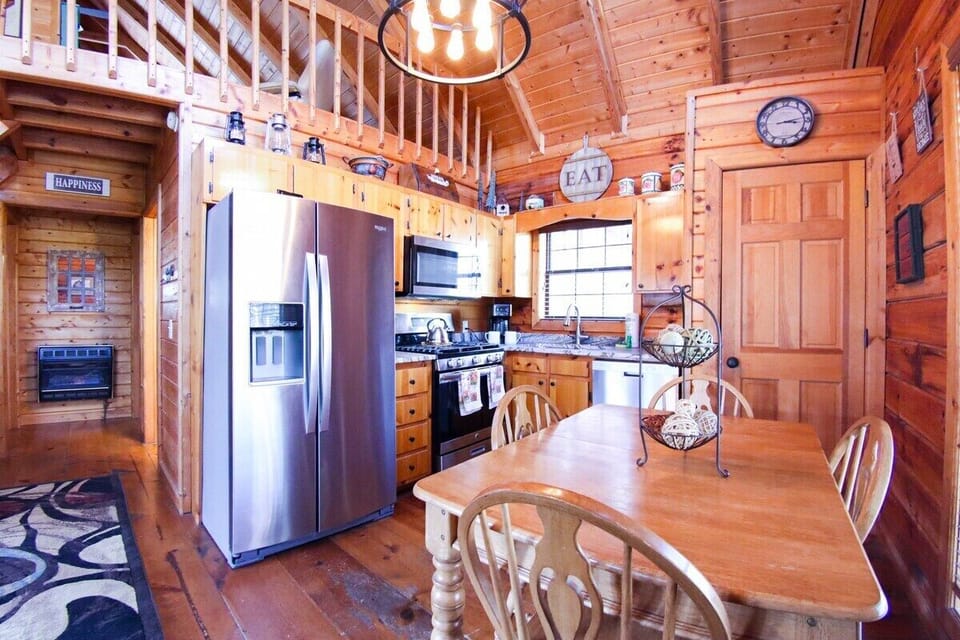 Convenient dining just steps away from the kitchen - seat four comfortably in this cozy nook.