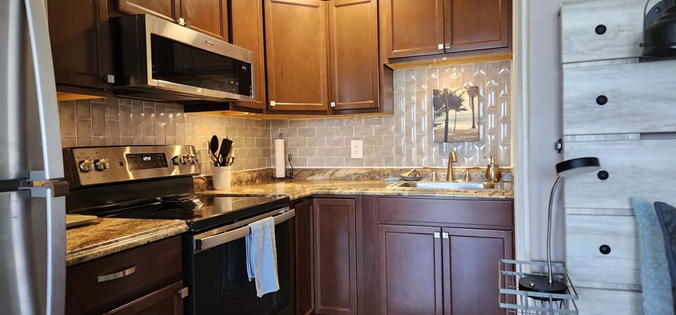 updated, well stocked kitchen