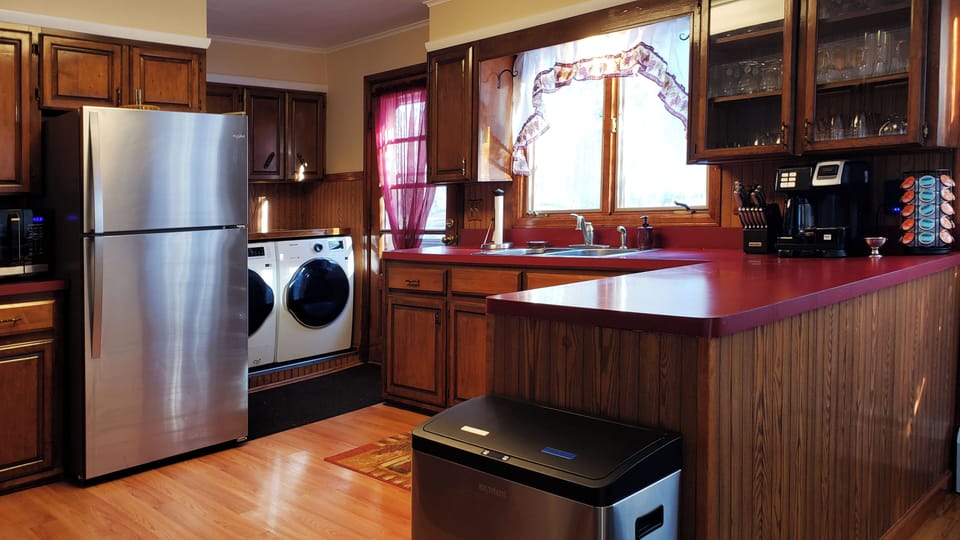 This kitchen is a 'lil old school having laundry included in the appliances.