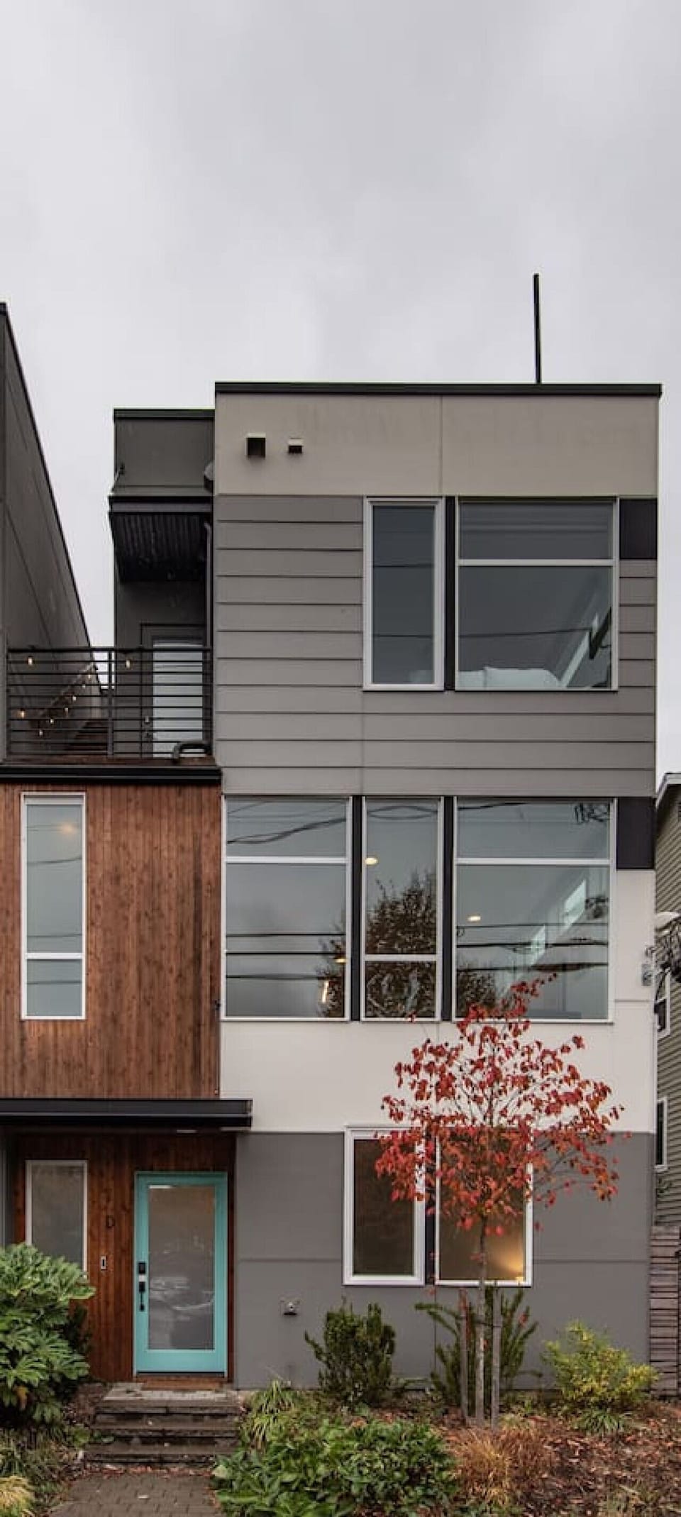 View from the outside - modern three story townhouse. Make sure to enter D (right door). There should be free street parking directly in front of the house