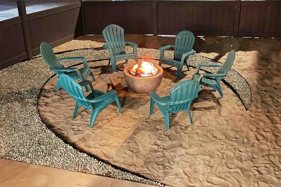 Sand pit is complete with fire pit and chairs for the bonfire experience. When you arrive, there is a tarp covering this area to keep it nice for use. Chairs and pit are on the side of the house. We're always happy to help set up!