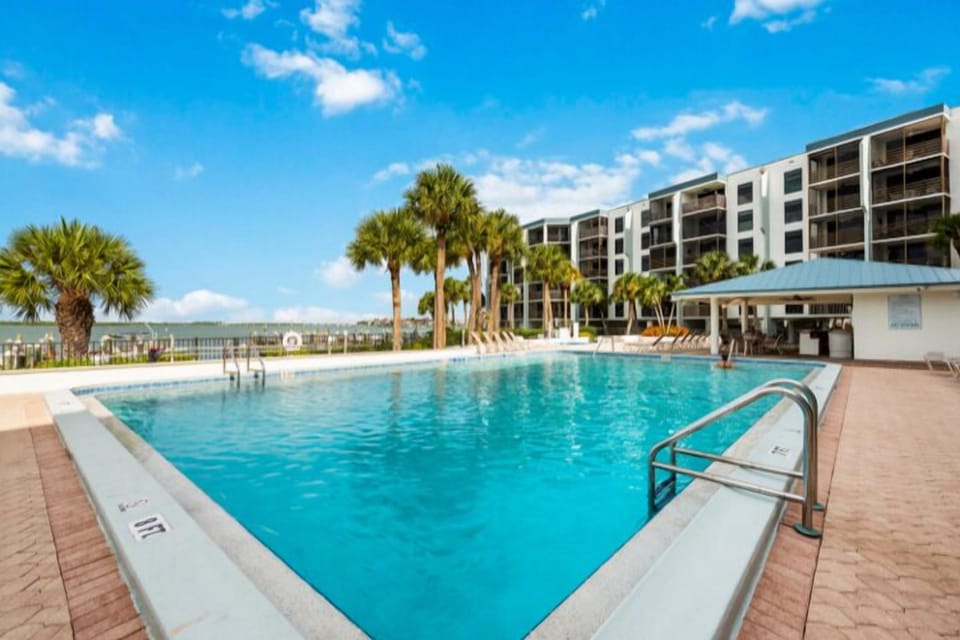 Take a dip in one of the large, pristine pools on property.
