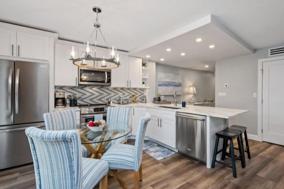 Enjoy breakfast lunch or dinner in this pristine kitchen.