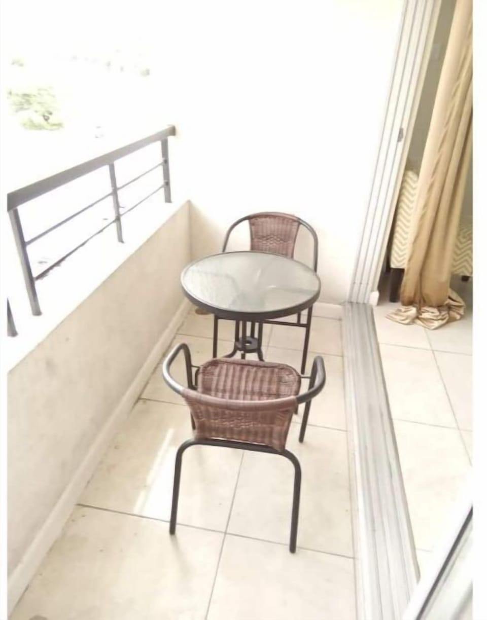 Balcony where you can view  the spectacular sunset  also indoor out door feelin.