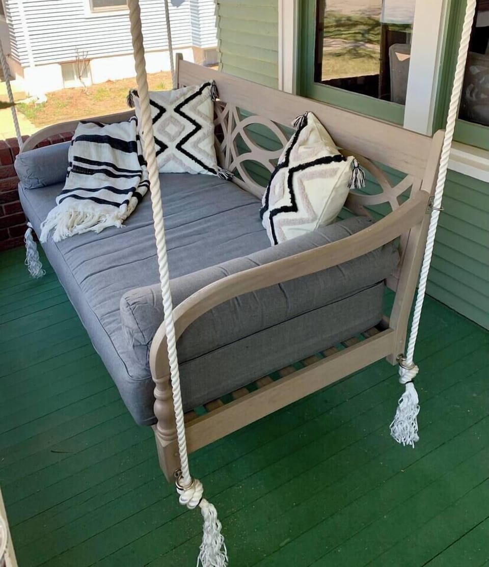 Imagine watching golfers from the view of your porch swing!