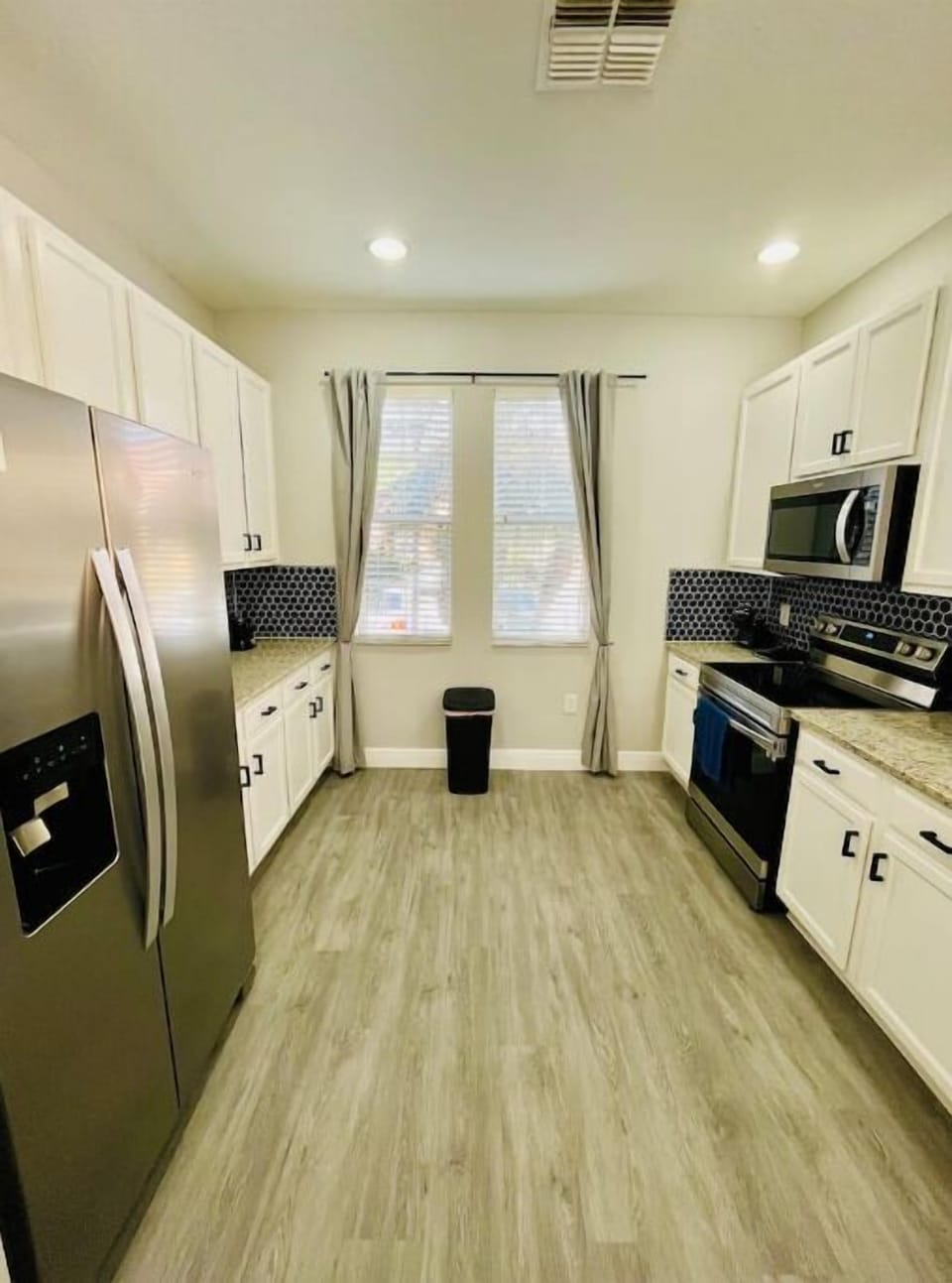 Beautiful kitchen with tons of counter and cabinet space 