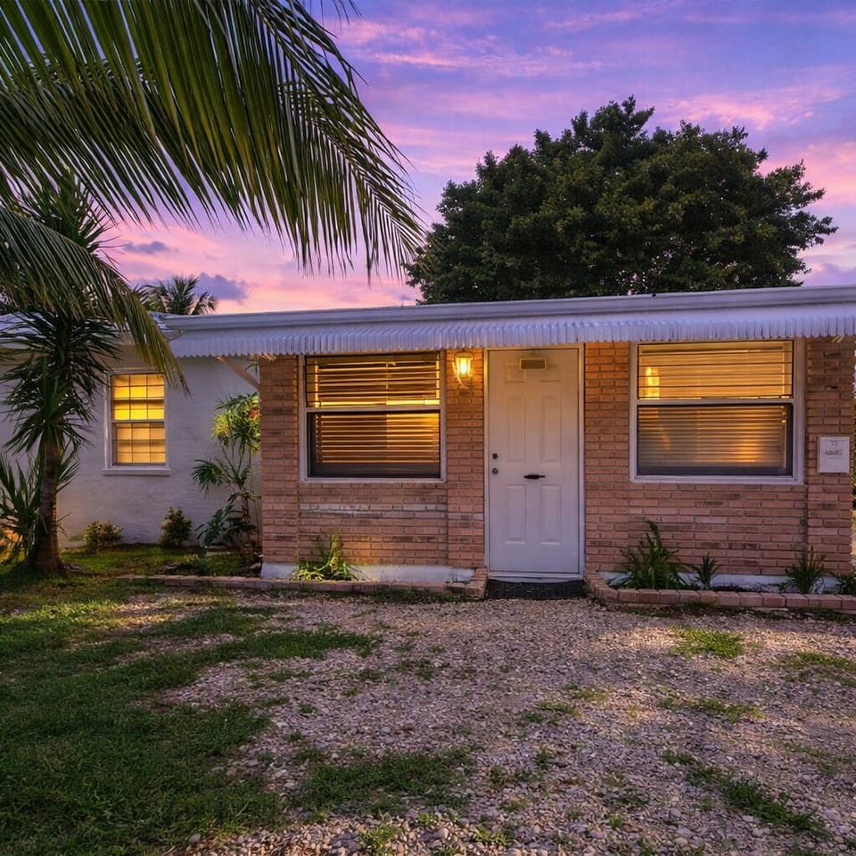 Charming and cozy under a lavender sunset sky—your perfect home away from home. 🌅🏡