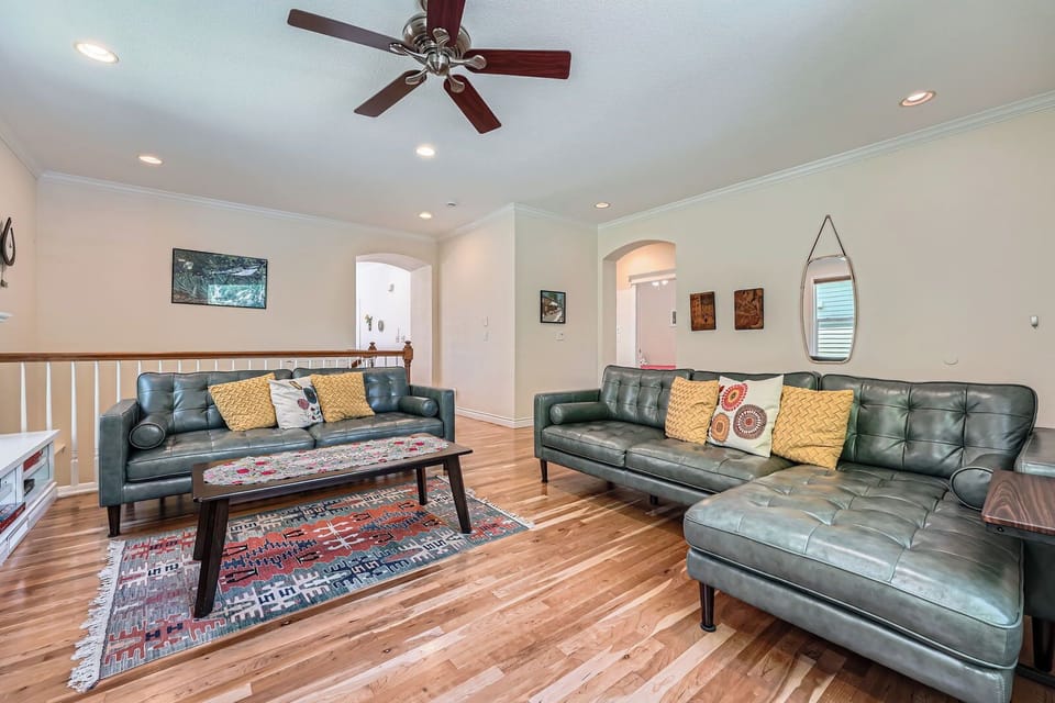 Spacious living area with lots of natural light.