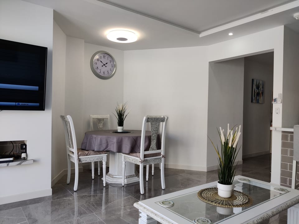 Dining area with Bluetooth light speaker above so as you can enjoy your meals and listen to your music stream at the same time.
