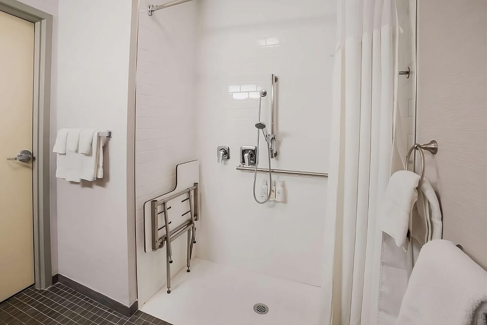 Full bathroom with a shower. Basic toiletries and towels are provided