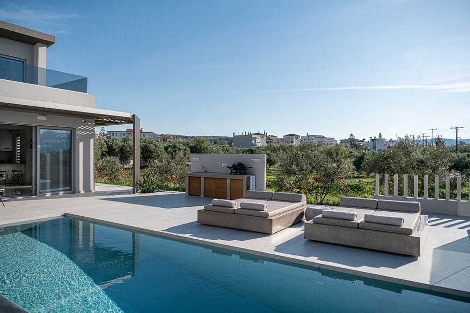 The private villa features a private pool & dining settings.