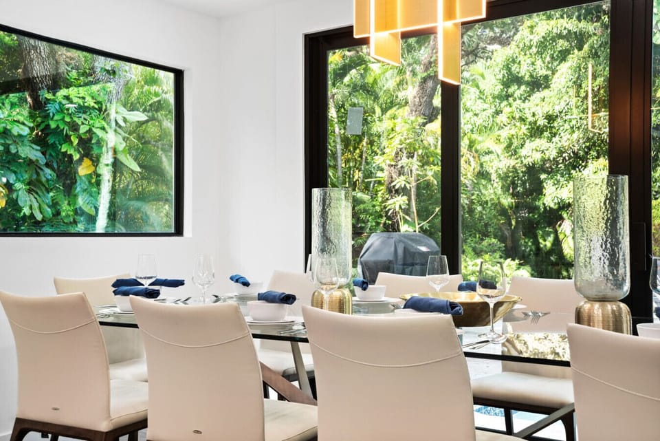 Eight seat table for family dinners by the glass