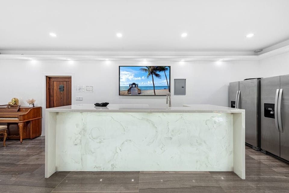 Entertainment bar with sink and beverage space