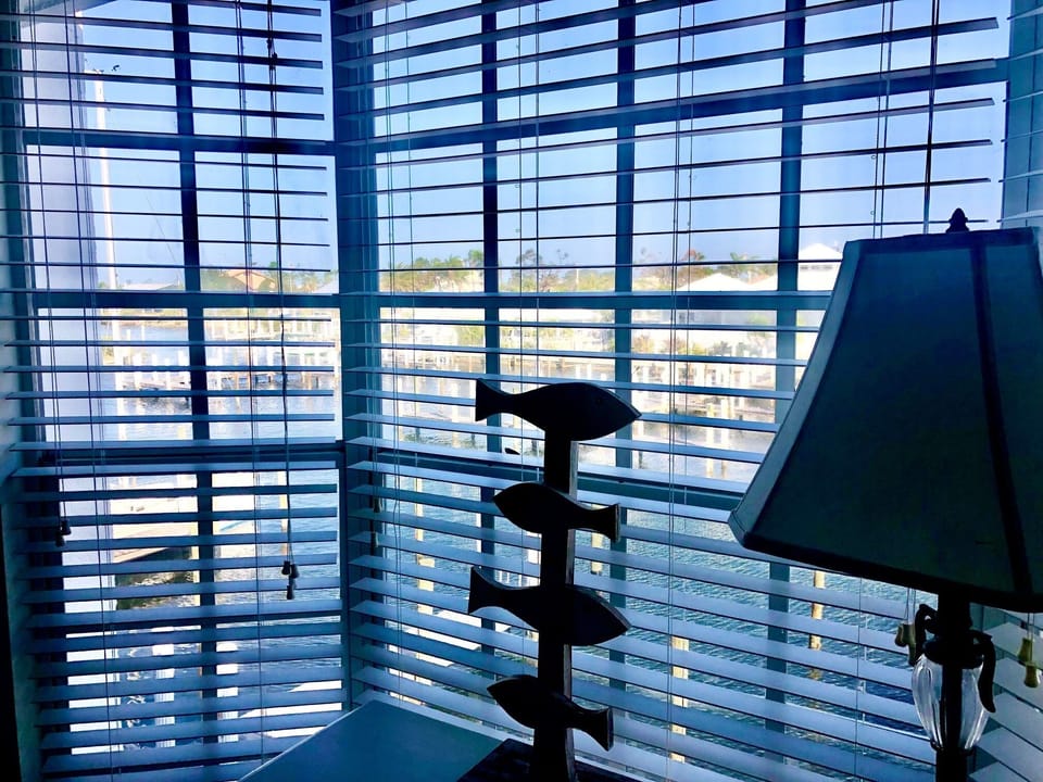 View of the pool and docks from the bedroom