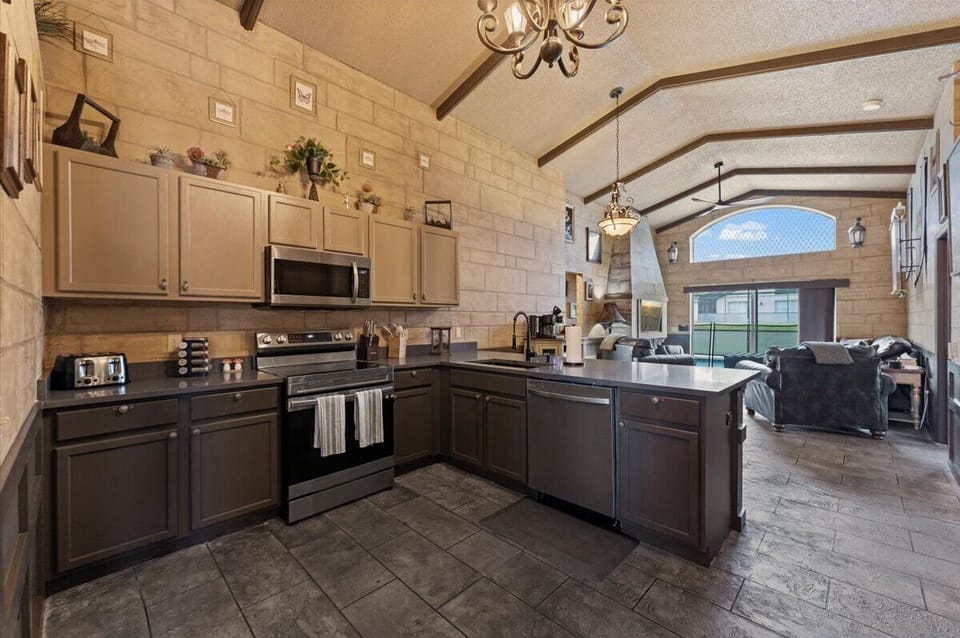 Open Kitchen to Living Room and Pool Deck