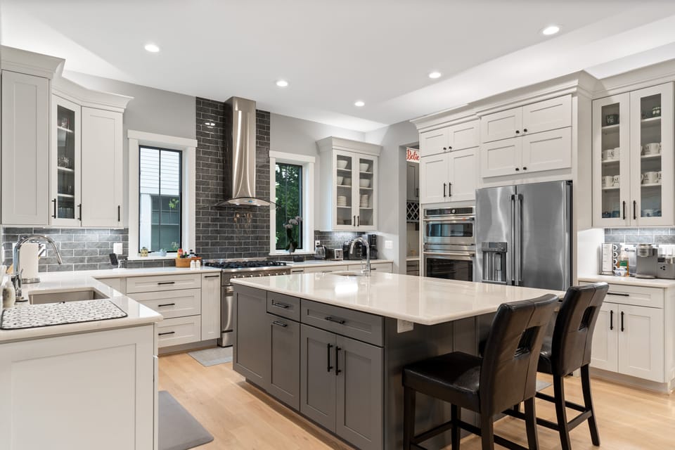 Gourmet kitchen fully equipped with spices, cooking spray oil oil and more