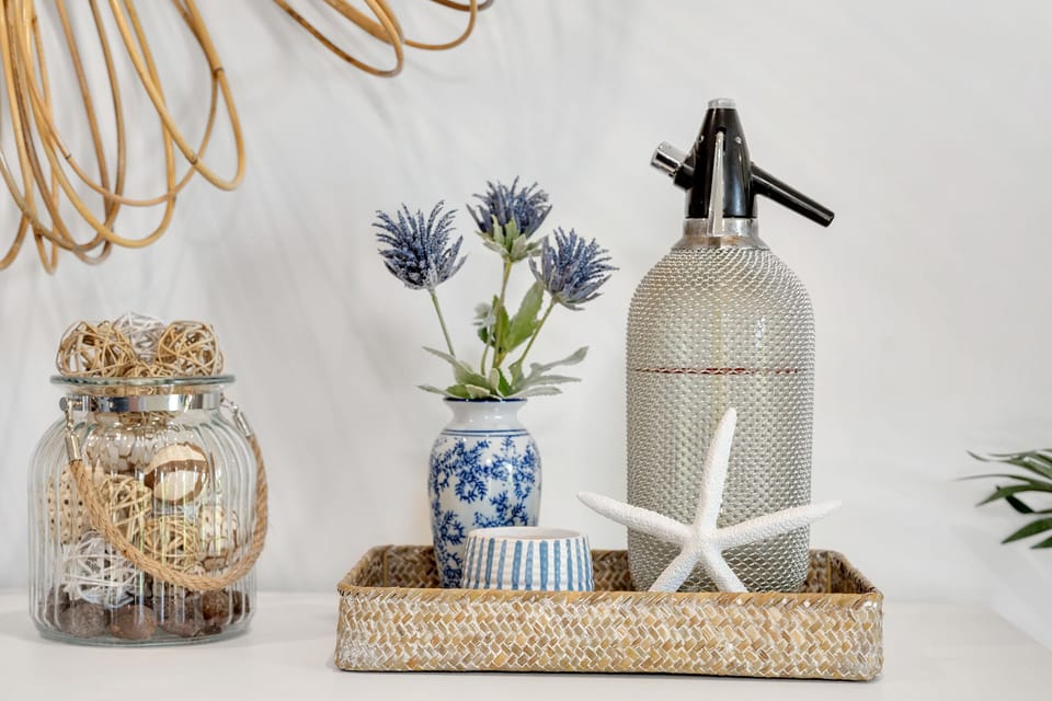 Blue and white decor sets the tone for the Hamptons style throughout the home