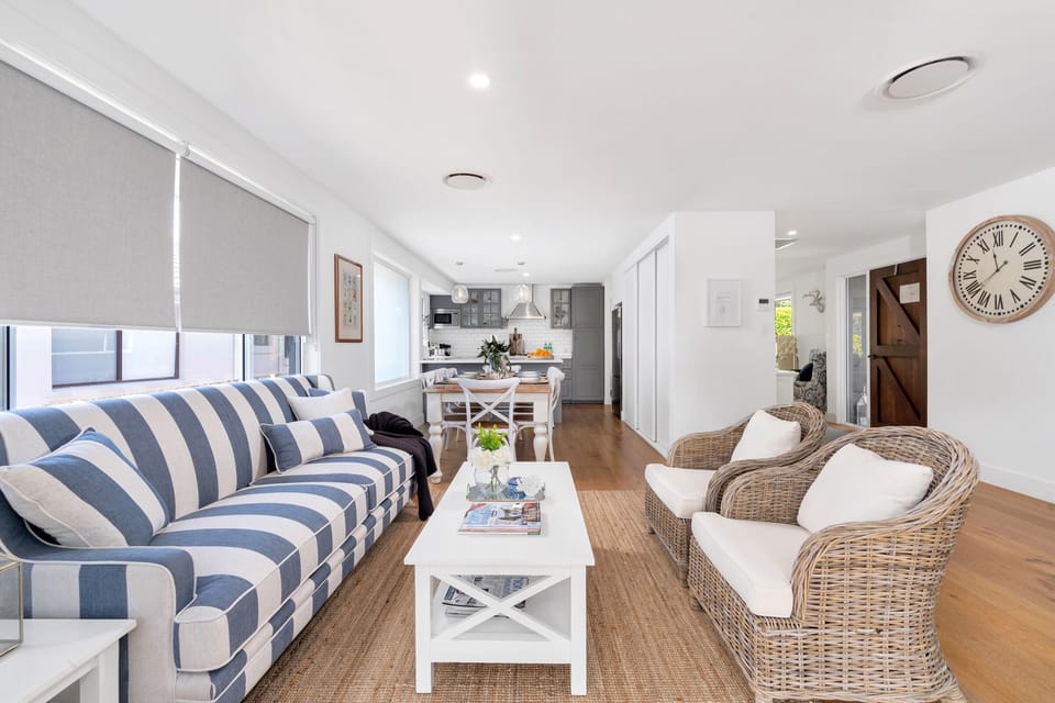 Living room, dining and kitchen in the background