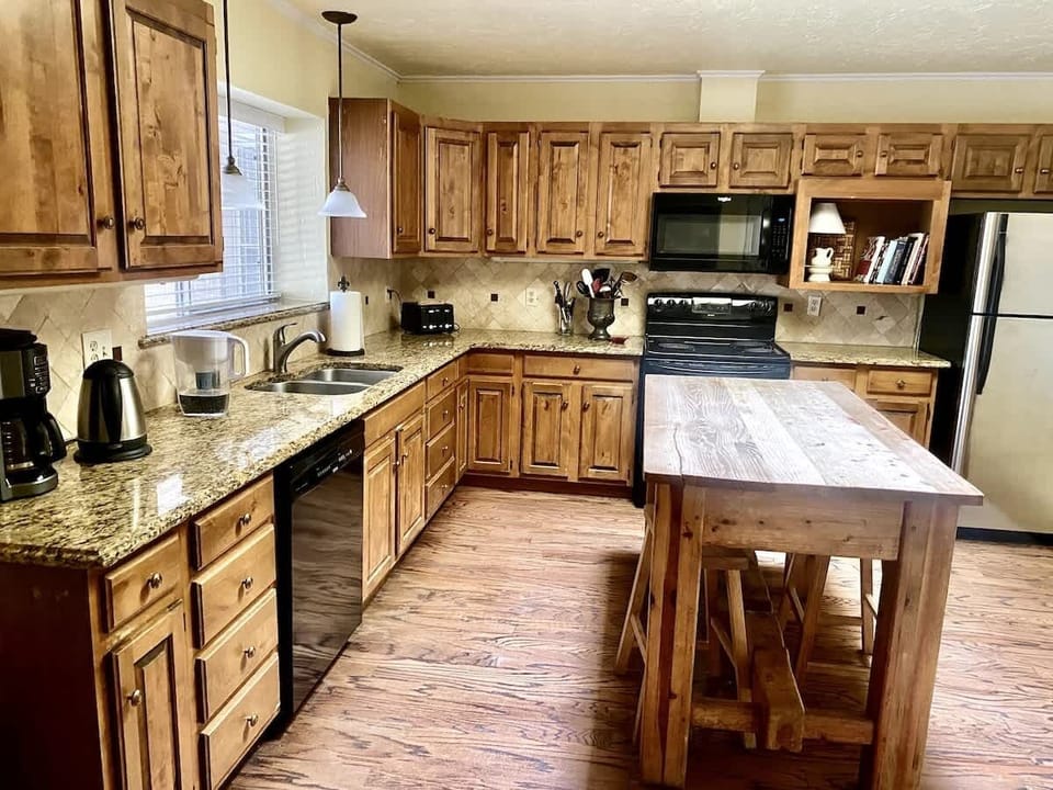 LARGE open kitchen and fully stocked to make your favorite home cooked meals