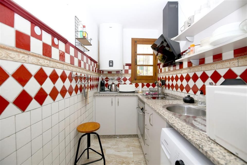 Another view of the typical kitchen in this apartment