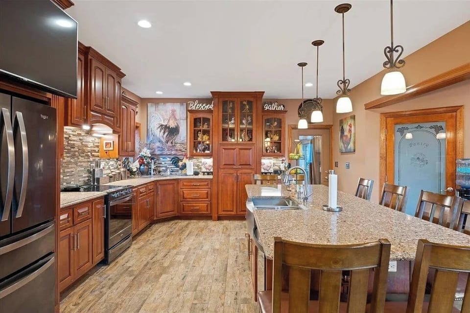 Make cooking fun in this huge kitchen with walk in pantry, double sinks, and oversized kitchen island