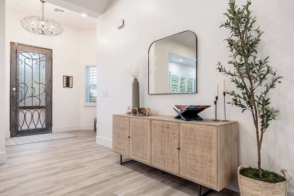 Step into your bright, welcoming entryway where natural light and modern design greet you. Thoughtful touches and open spaces set the tone for a relaxing stay.