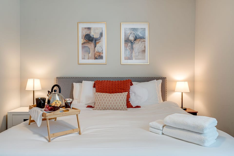 2nd Unit: Primary Bedroom featuring a King size bed and a flat-screen SMART TV with en-suite bathroom.