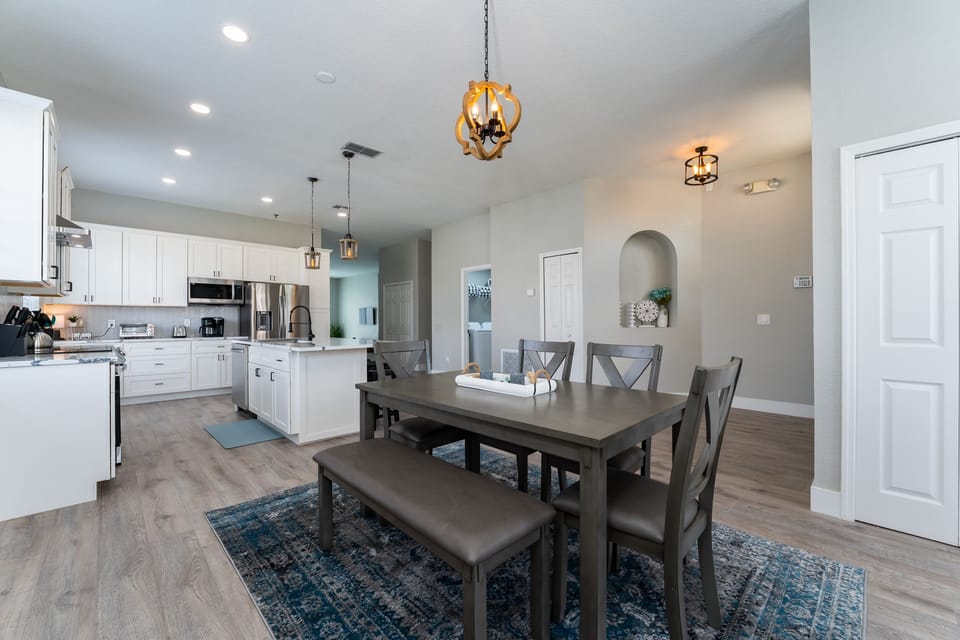 Spacious Living Area with Dining Table and Full Size Kitchen