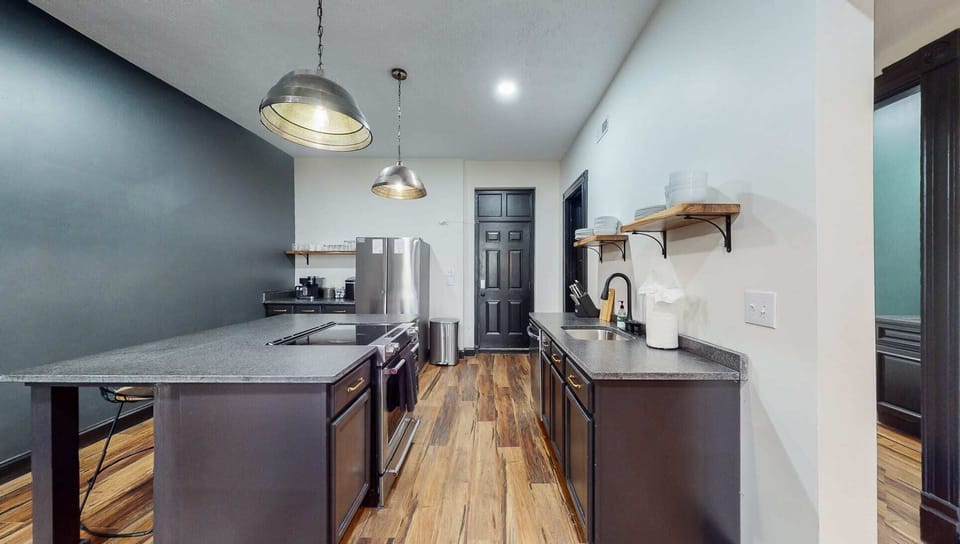 Kitchen: Our kitchen is spacious and features an open layout. It is fully equipped with all the essentials to prepare delicious meals. The well-designed setup allows for easy movement and smooth cooking.