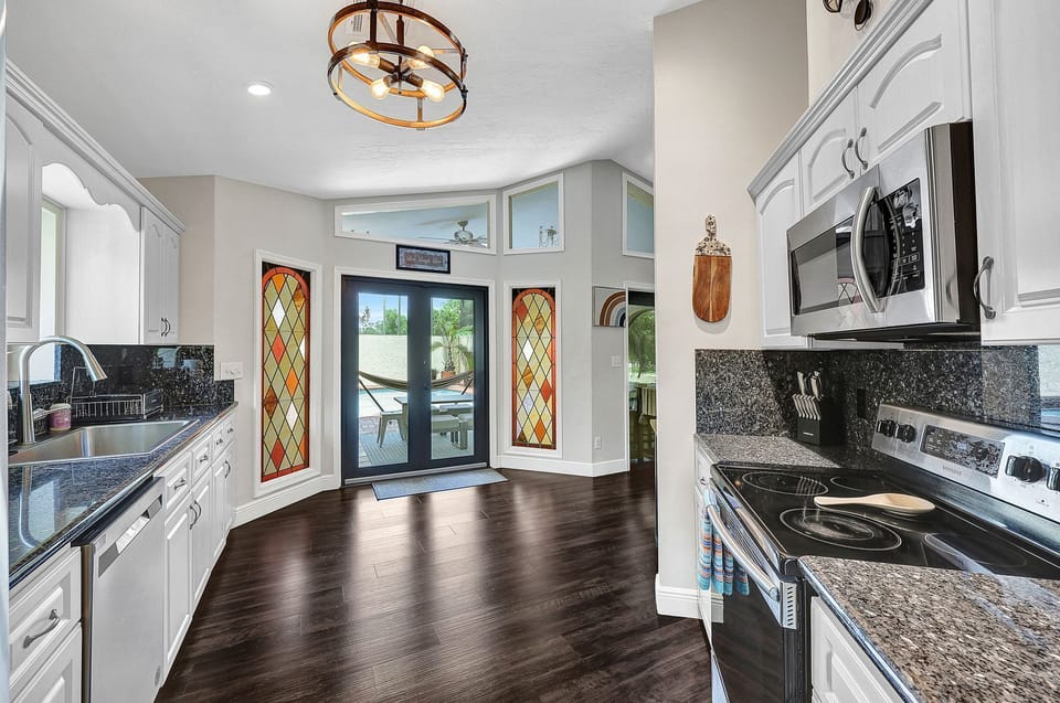 Fully equipped kitchen with all of the appliances, utensils, and amenities you need to prepare meals (2)