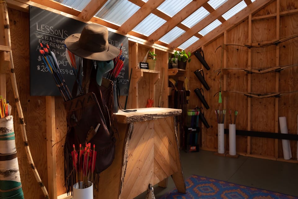 Inside the Highland Bow & Arrow archery shop - merch for sale