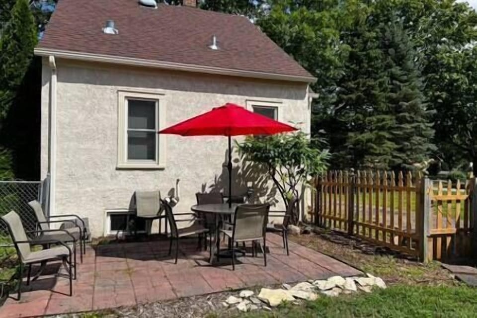 Back yard with patio and fence