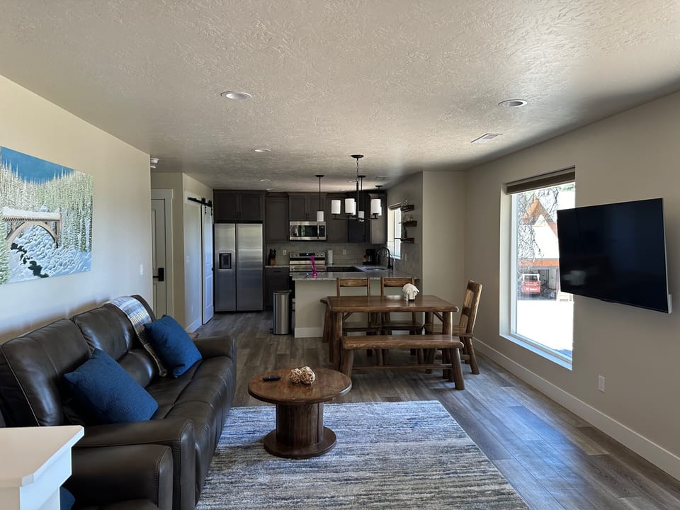 After walking up the stairs you see the living room, dining and kitchen.