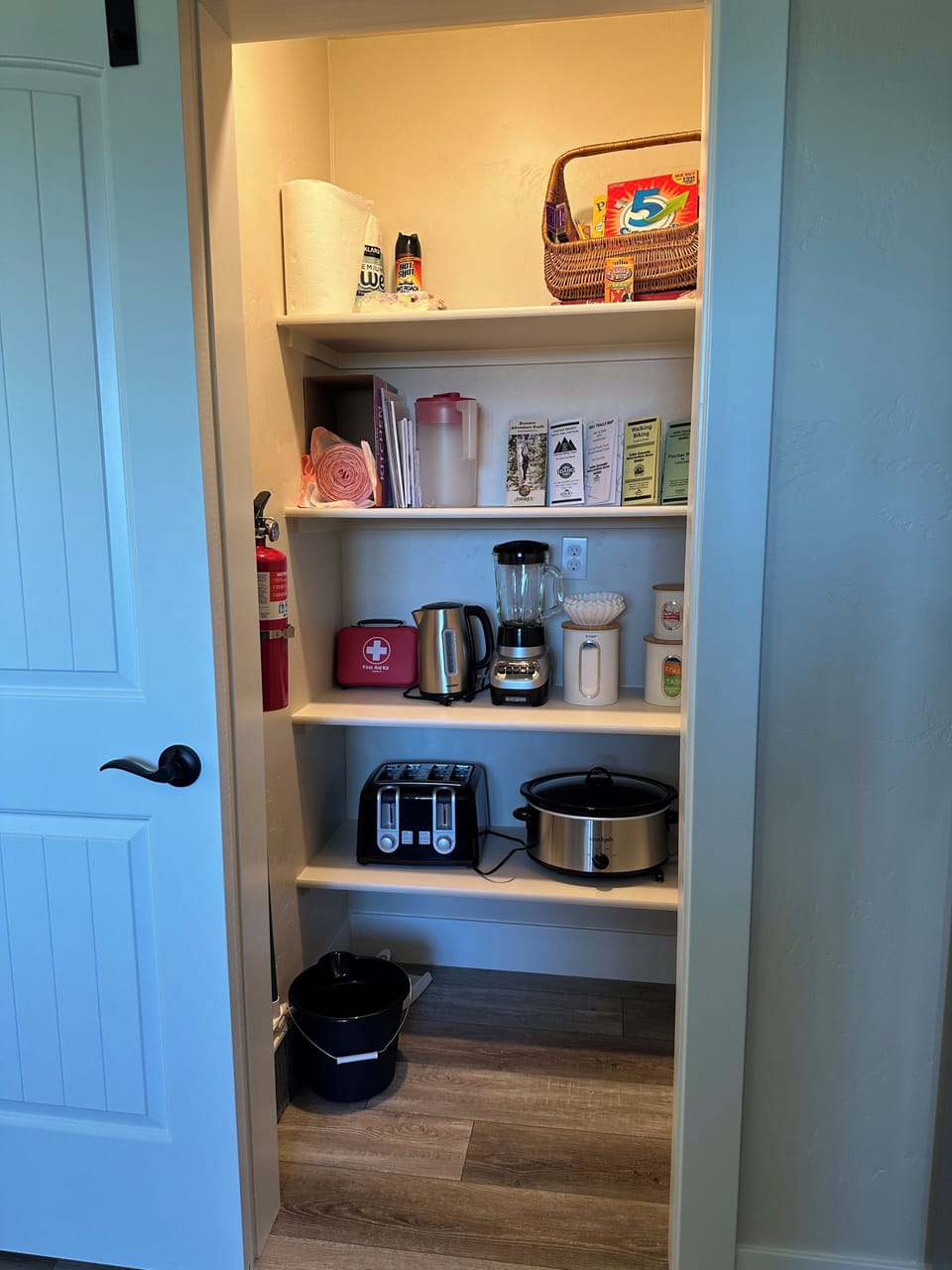Pantry has additional appliances.  Fire extinguisher and first aid kit.