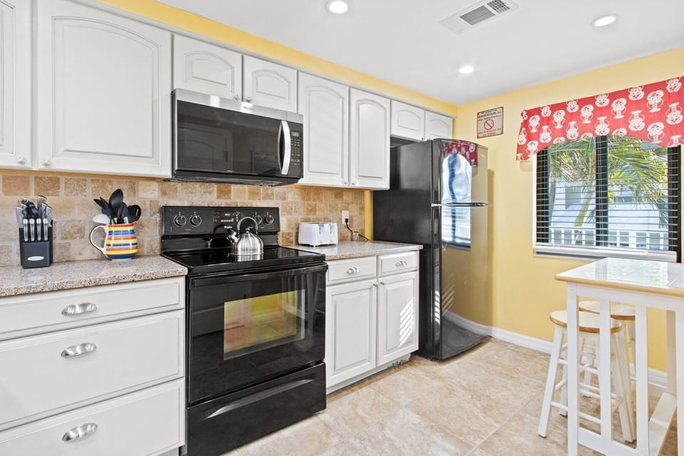 Spacious kitchen with updated appliances and everything you need to whip up your favorite meals.