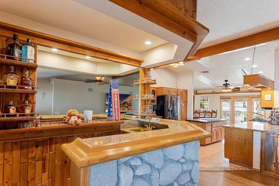 Fully-equipped kitchen and bar area.