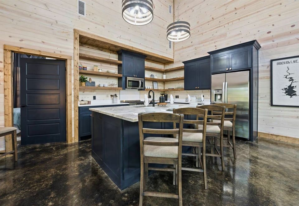 Our kitchen bar is the perfect blend of sophistication and convenience—grab a stool and savor casual meals and chats.