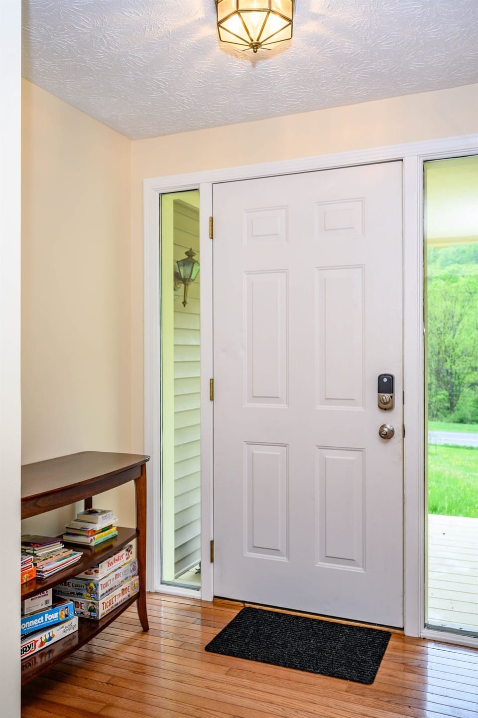 Large foyer has table to drop your keys and coat closet for your coats and shoes.