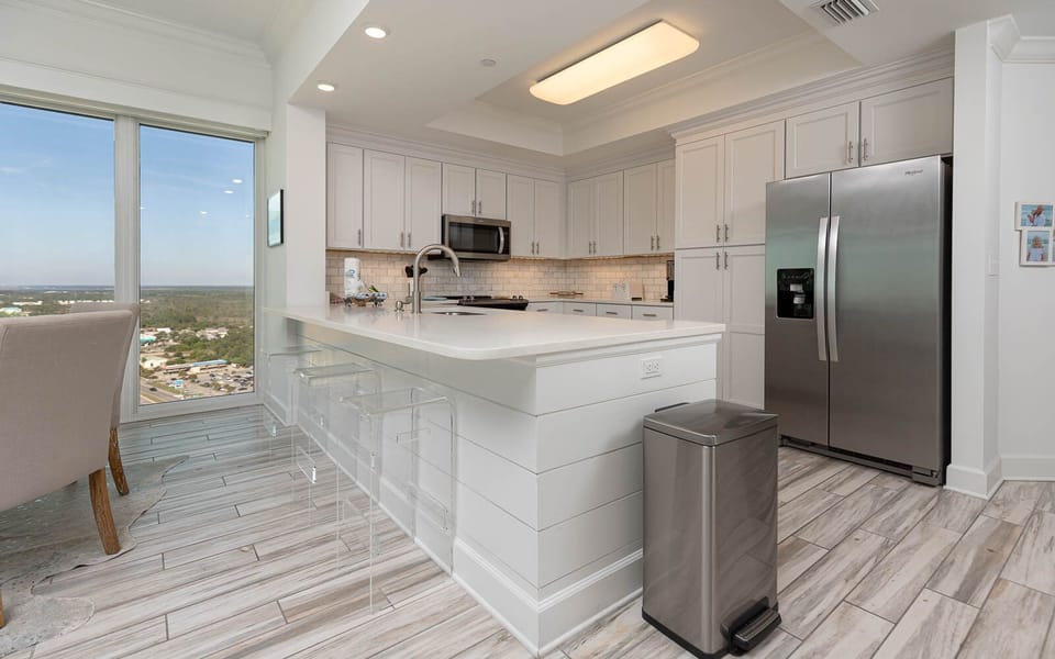 Savor your morning coffee at the bar, taking in the coastal views that inspire relaxation and joy