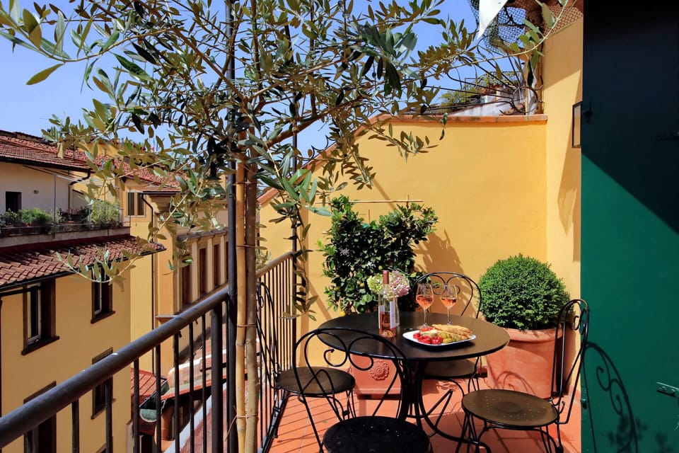 An awning covering the terrace makes it especially inviting on sunny days.