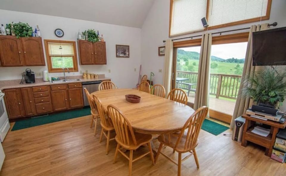 The dining area is in a well-lit, bright kitchen.