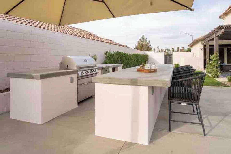 custom exterior bar with sink and BBQ and searing station ... (2)