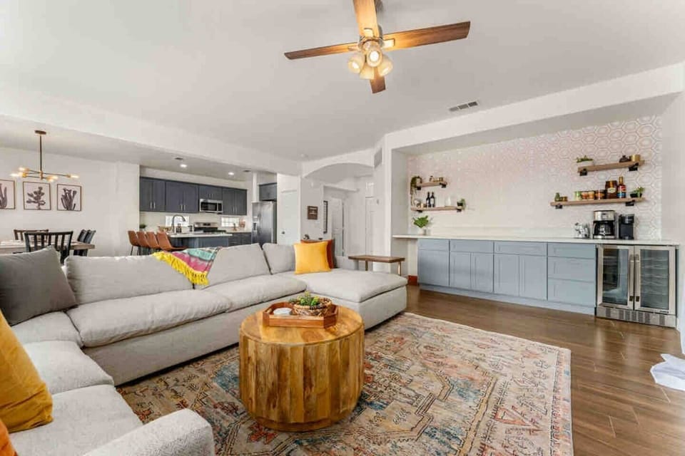living room complete with coffe bar and wine cooler 